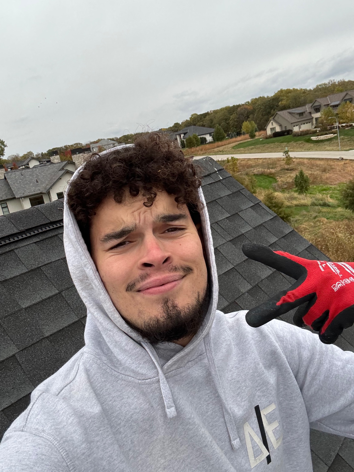 Ike Onwuegbu, founder of Sunnetics, on a Nebraska roof